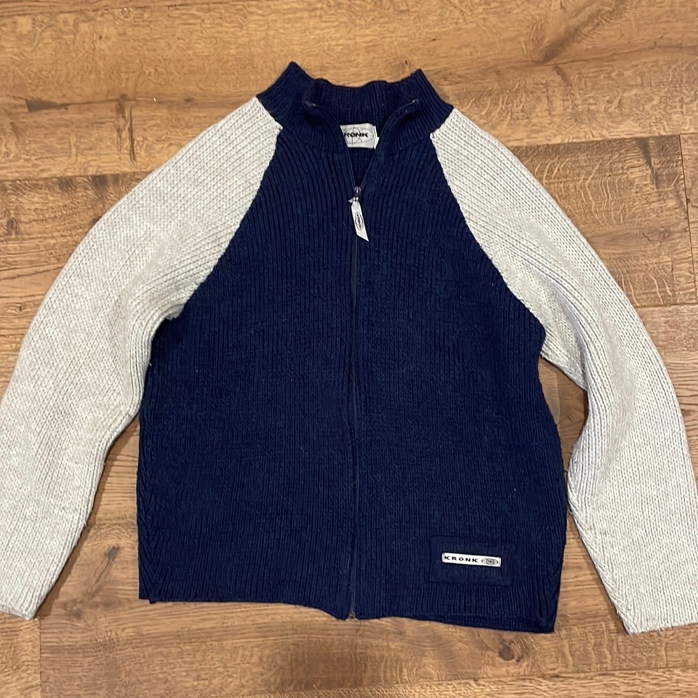 Nice thick woven cardigan, navy blue, and cream. Perfect condition.